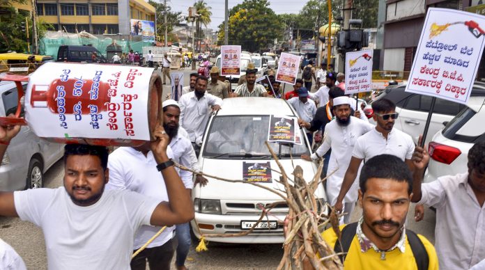 Protest against price hike of fuel and LPG cylinder