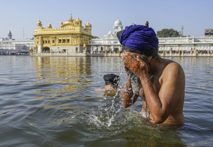Baisakhi: Sikh devotees at Golden Temple