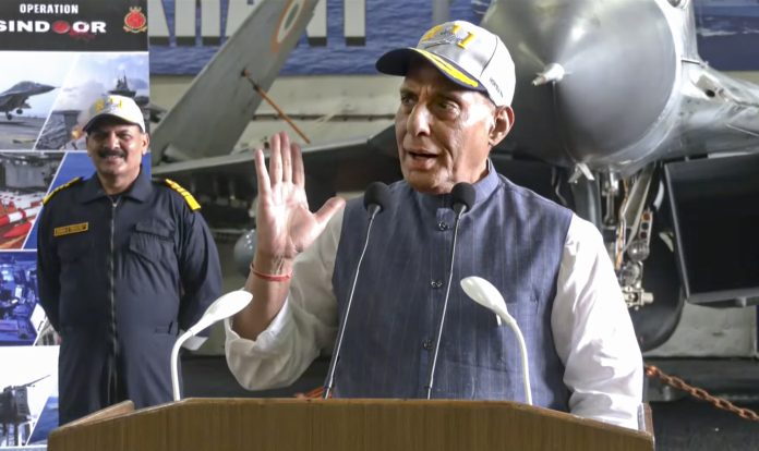 Rajnath Singh meets naval officers aboard INS Vikrant