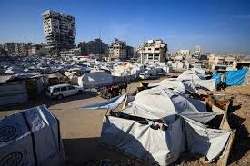 Strikes across Gaza kill at least 92 as Israel prepares to ramp up its offensive