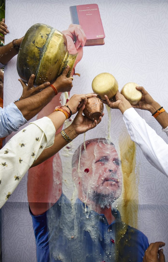 Comgress supporters celebrate caste census decision