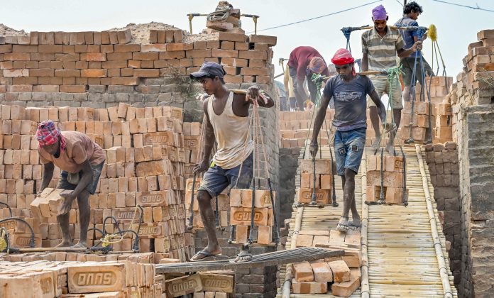 Labour Day: Labourers at brick factory