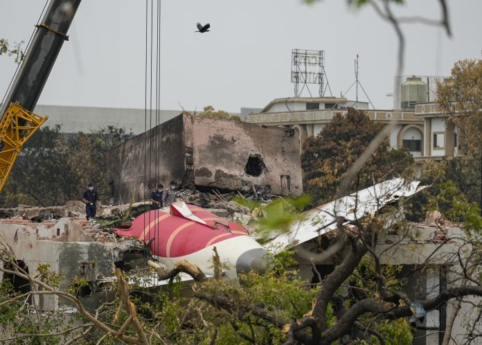 Ahmedabad plane crash: Wreckage of the plane being moved
