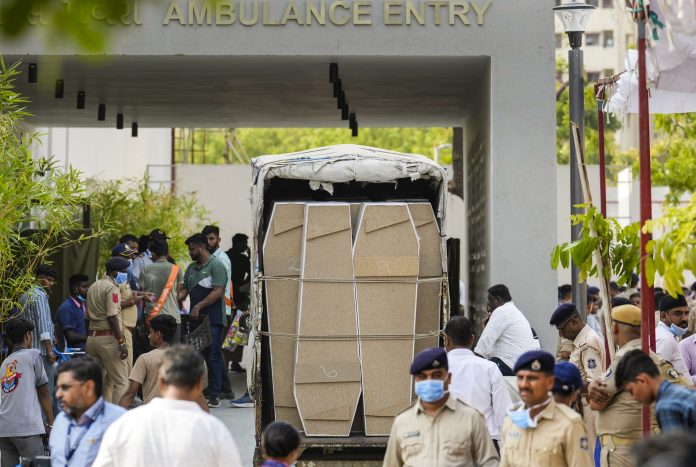 Ahmedabad plane crash: Coffins arrive at the hospital for victims' bodies to be sent to their families