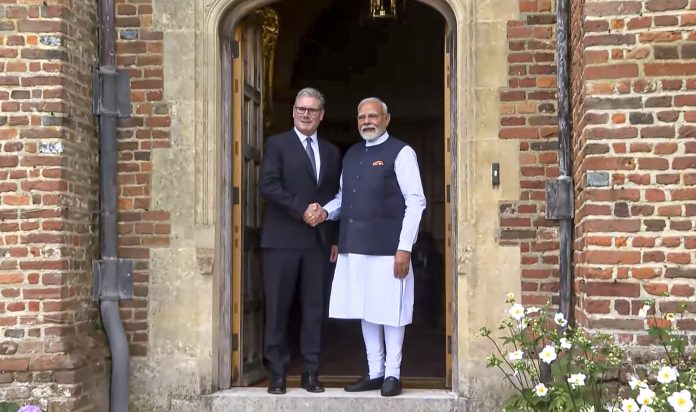 PM Modi meets UK PM