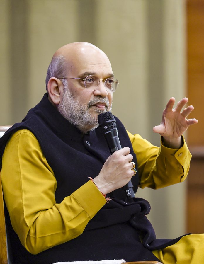 Amit Shah interacts with Sarathis of Bharat Taxi