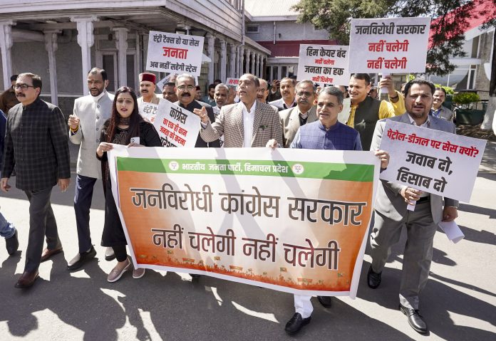 HP BJP MLAs protest against state govt.