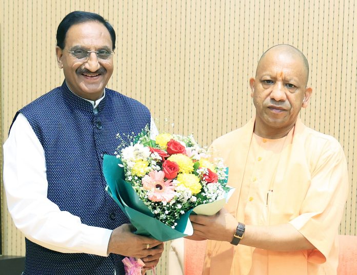 Yogi Adityanath meets Ramesh Pokhriyal