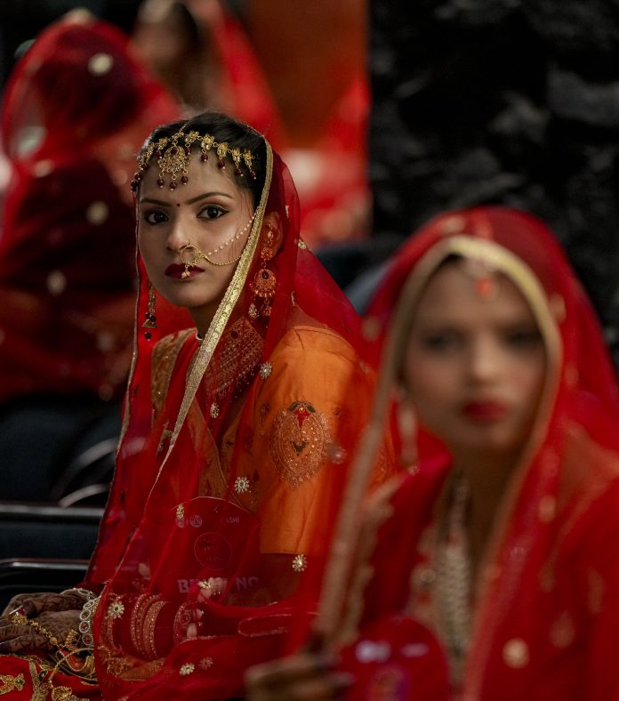 Mass wedding ceremony at Delhi's JLN Stadium