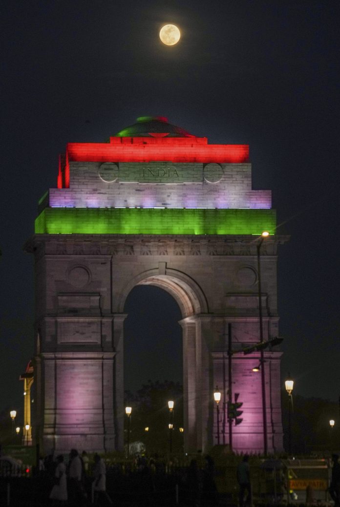 A Pink moon rises over India Gate